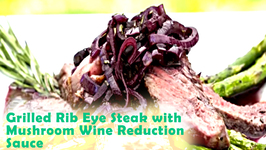 Grilled Rib Eye Steak with Mushroom Wine Reduction Sauce