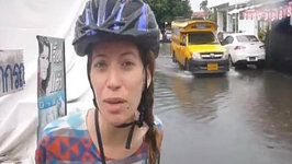 Riding Our Bicycles Down the Street During a Flash Flood in Chiang Mai, Thailand 