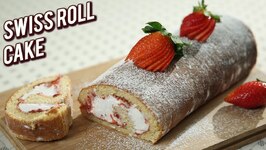 Strawberry Swiss Roll Cake - Eggless Swiss Roll Cake Recipe - Christmas Special Cake Recipe - Ruchi