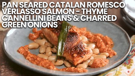 Pan Seared Catalan Romesco Verlasso Salmon - Thyme Cannellini Beans And Charred Green Onions