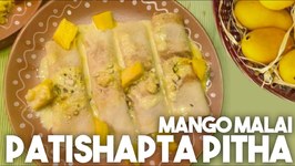 Patishapta Pithe - Mango Malai / Coconut Crepes With A Creamy Mango Sauce