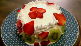 Eggless Mixed Fruit Cake With Cream Icing - Recipe By Archana - Easy To Make At Home