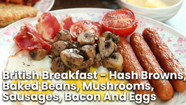 British Breakfast - Hash Browns, Baked Beans, Mushrooms, Sausages, Bacon And Eggs